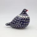 A charming decorative piece symbolizing peace and love, perfect as a gift or home decor.