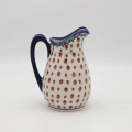 We present an authentic Bolesławiec pottery pitcher, which perfectly blends centuries of Polish craftsmanship tradition with modern functionality.